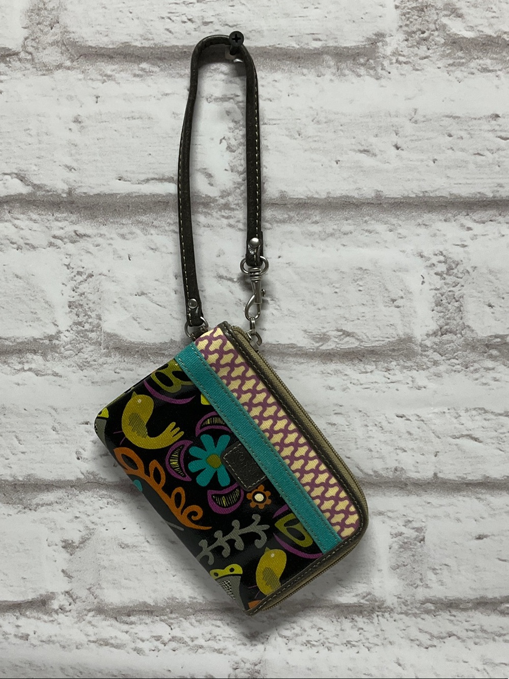 Fossil Black Floral Print Wristlet with Teal Trim